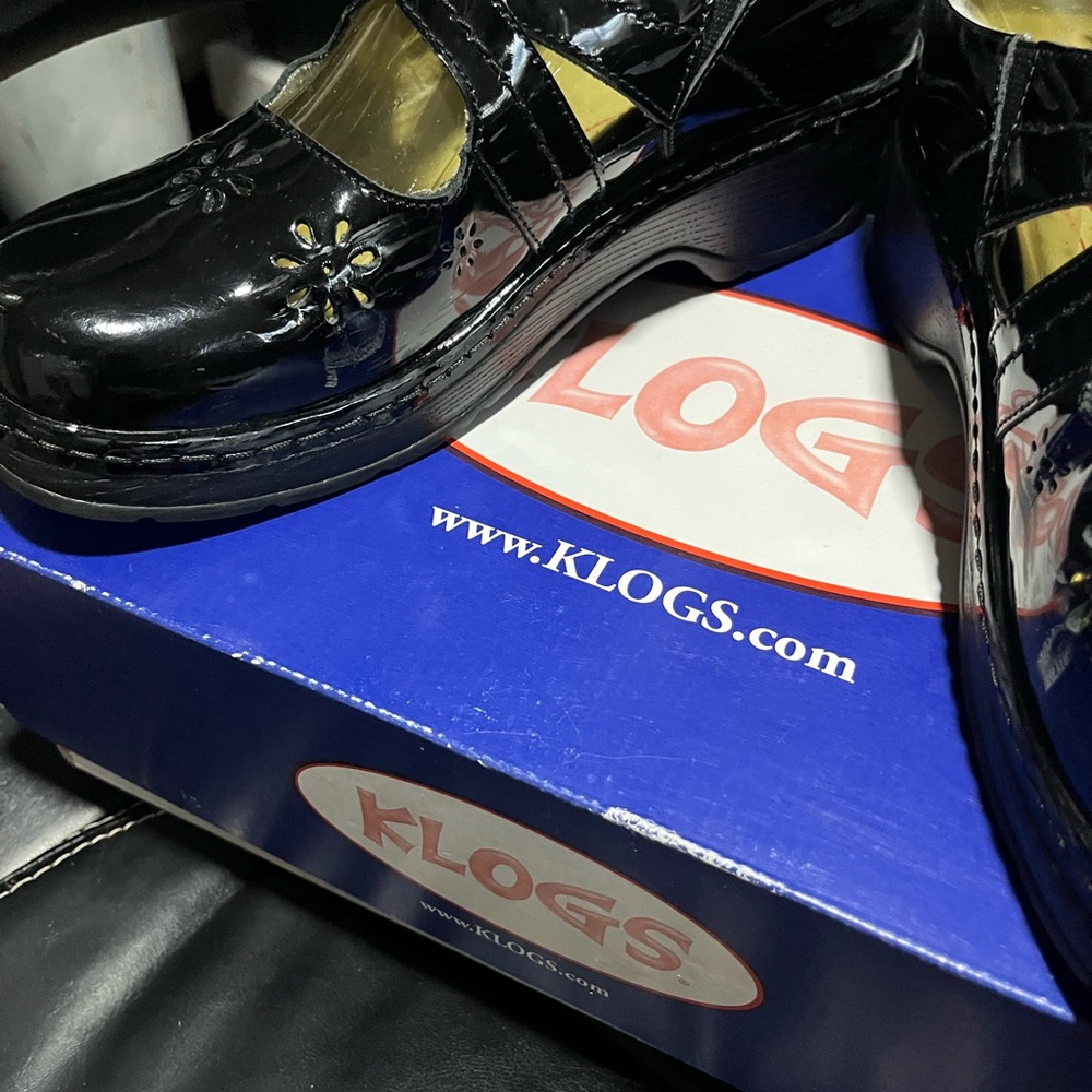 Klogs Shiny Black Floral Cutout Clogs
